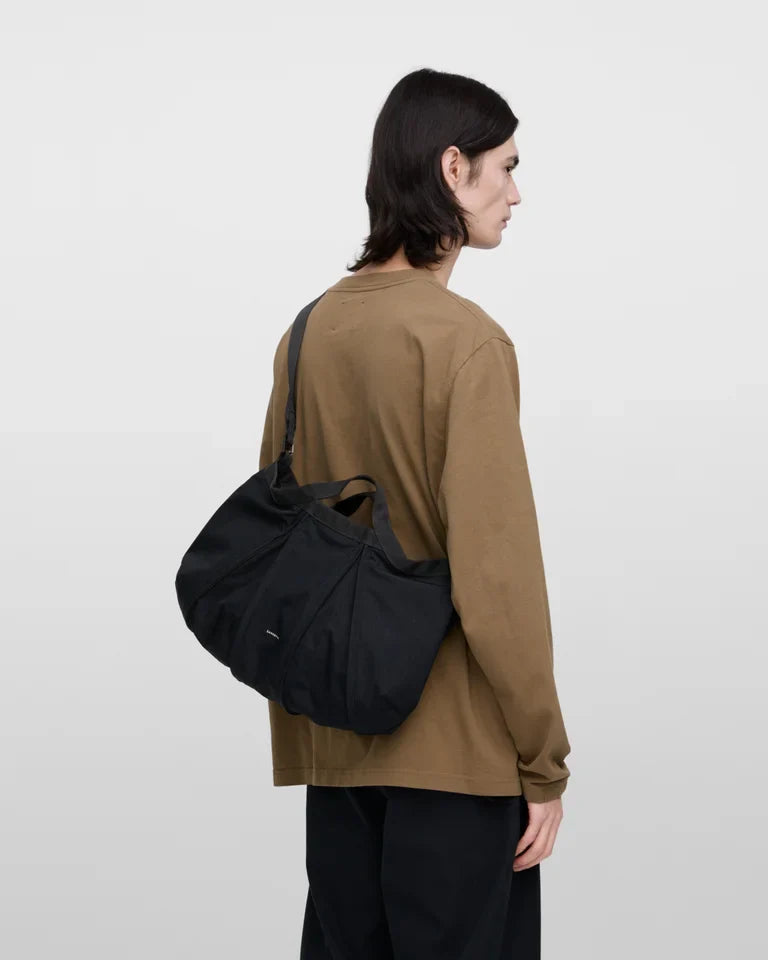 GRID Expandable Crossbody Bag