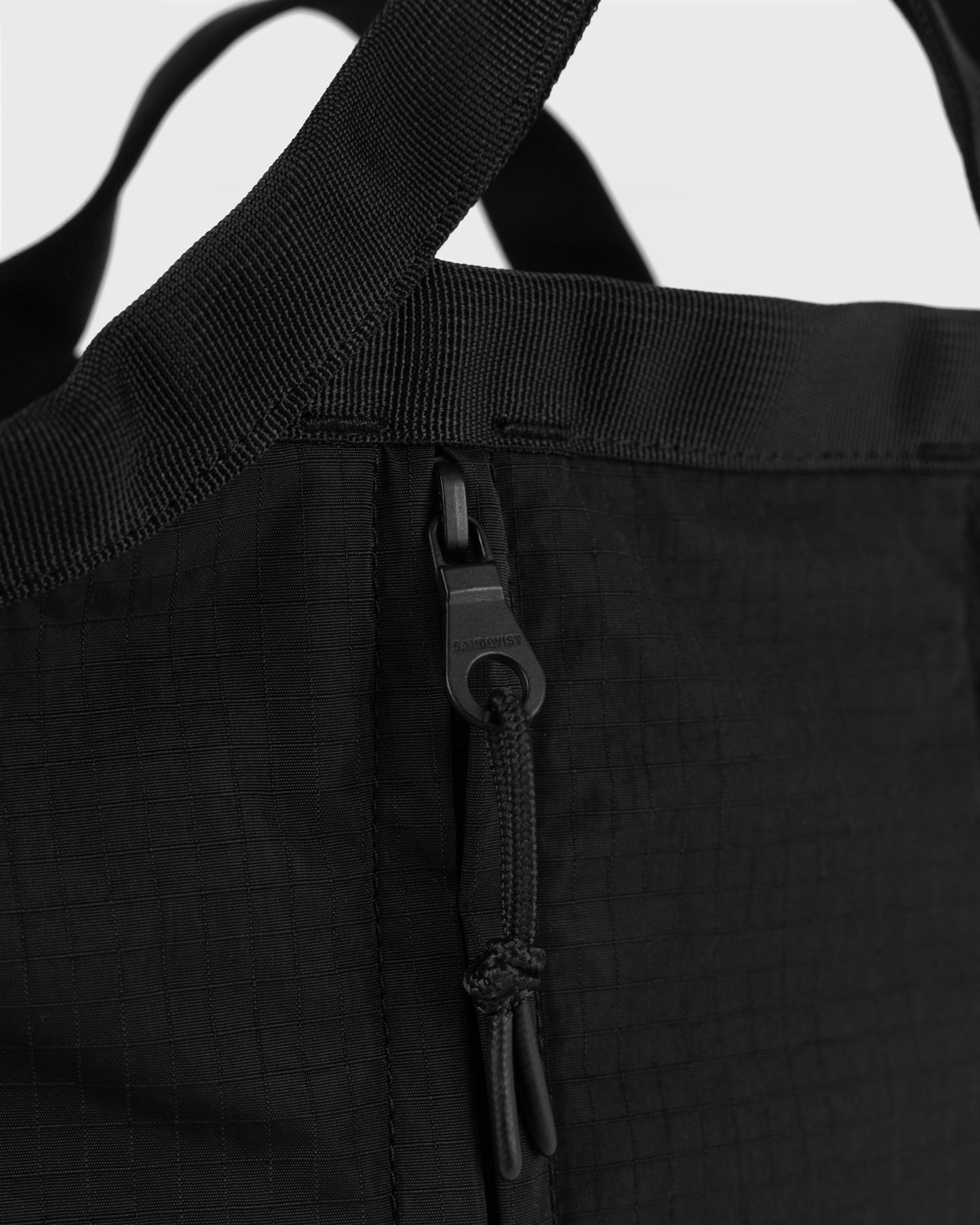 GRID Expandable Crossbody Bag
