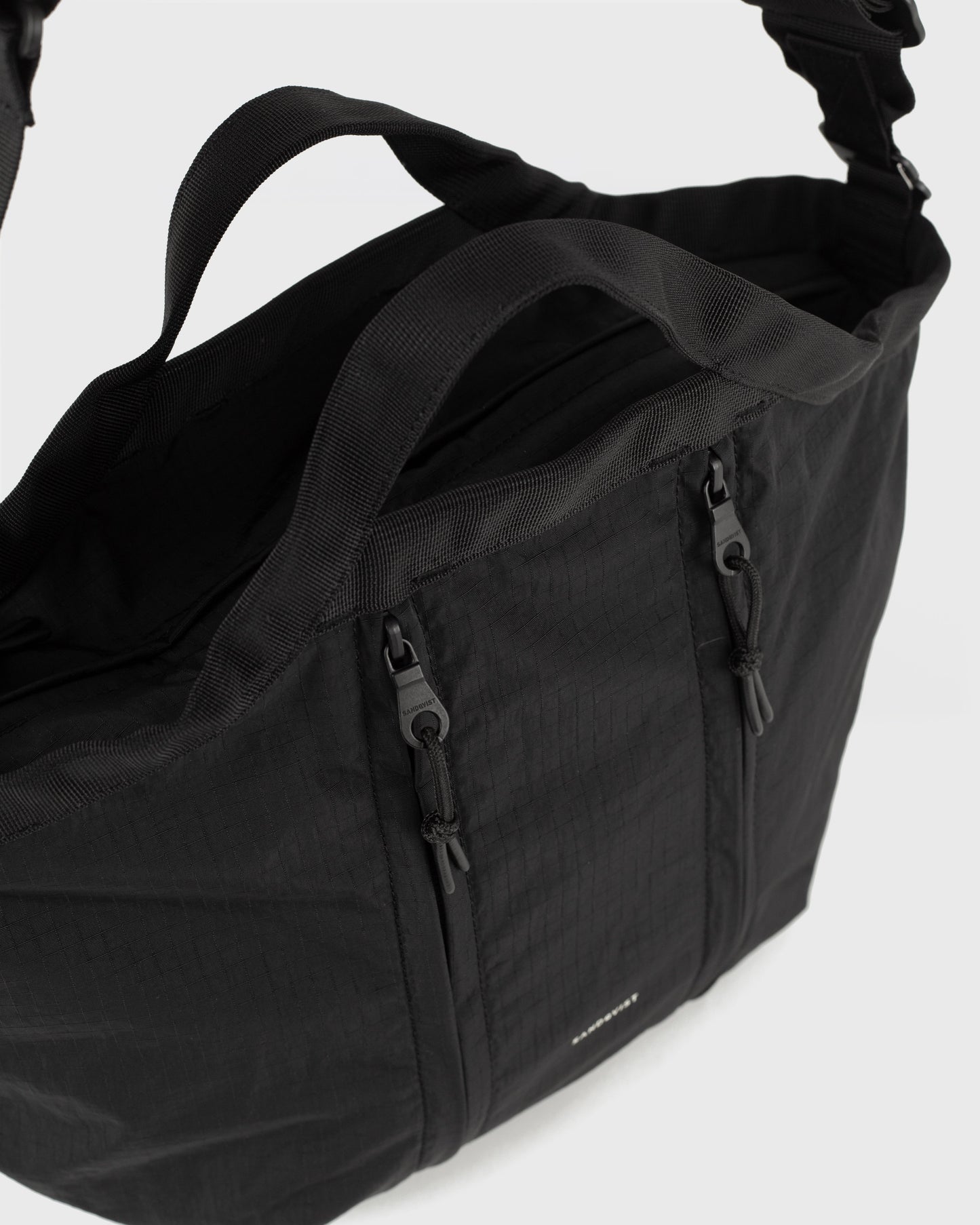GRID Expandable Crossbody Bag