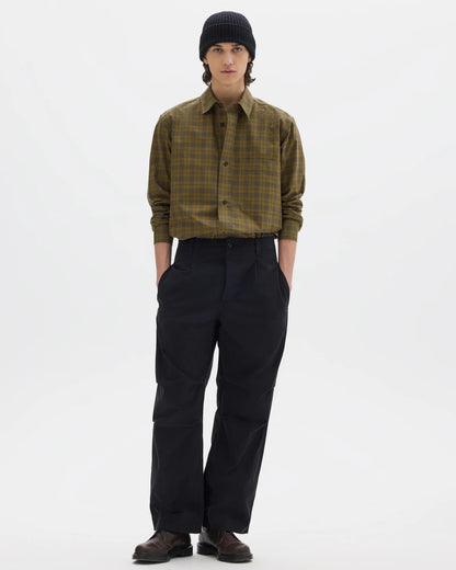 MHL. Parachute Trousers — relaxed-cut cotton poplin with pleated knee detailing, corozo buttons, drawstring waist. 100% cotton, made for movement. | oldpinetreeswear