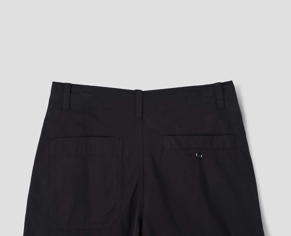 MHL. Parachute Trousers — relaxed-cut cotton poplin with pleated knee detailing, corozo buttons, drawstring waist. 100% cotton, made for movement. | oldpinetreeswear