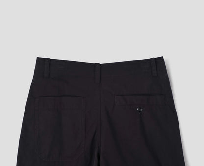 MHL. Parachute Trousers — relaxed-cut cotton poplin with pleated knee detailing, corozo buttons, drawstring waist. 100% cotton, made for movement. | oldpinetreeswear
