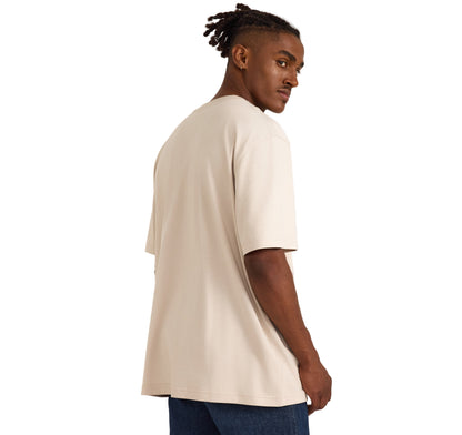 เสื้อยืด True Heavy Boxy Fit Tee สีเบจ ผลิตจากผ้าฝ้ายออร์แกนิก 100% เนื้อหนา 210 gsm ทรงโอเวอร์ไซส์คอกลม แขนสั้น ขายโดย Old Pine Trees | True Heavy Boxy Fit Tee Sandstone – 100% Organic Cotton heavyweight oversized crewneck T-shirt, sold by Old Pine Trees